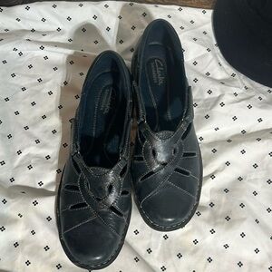 Leather Clark’s with Velcro adjust on either side like new 8.5